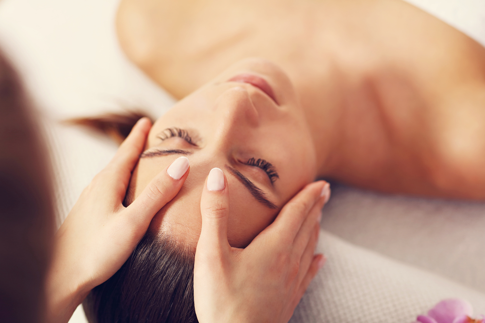 Women receiving massage therapy for sinuses