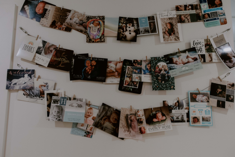 photo wall of baby announcements at acupuncture clinic in edmonton | acupuncture clinic near me
