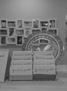 black and white photo of business cards for acupuncture clinic in edmonton