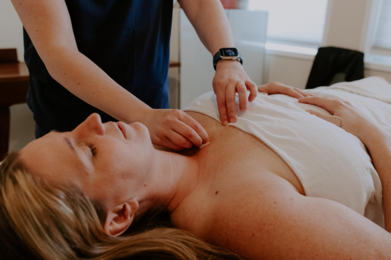 Acupuncture treatment on a woman during endometriosis awareness month for pelvic pain relief