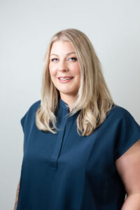 Acupuncturist portrait in clinic setting specializing in acupuncture for endometriosis and women’s health care